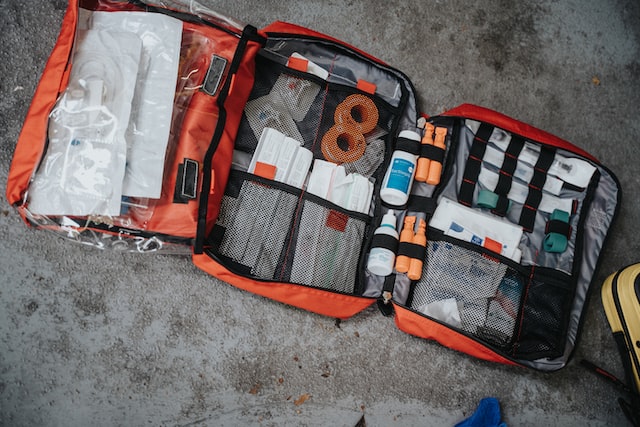 A bag containing basic medical supplies for emergencies. 