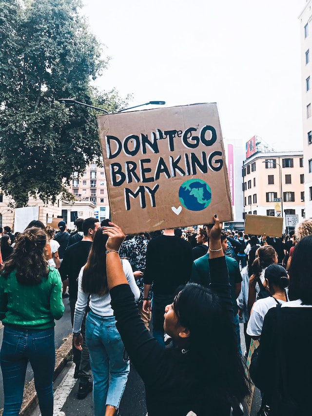 People take part in a climate protest