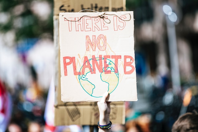 A sign carried by protesters emphasizing that earth is our only planet.