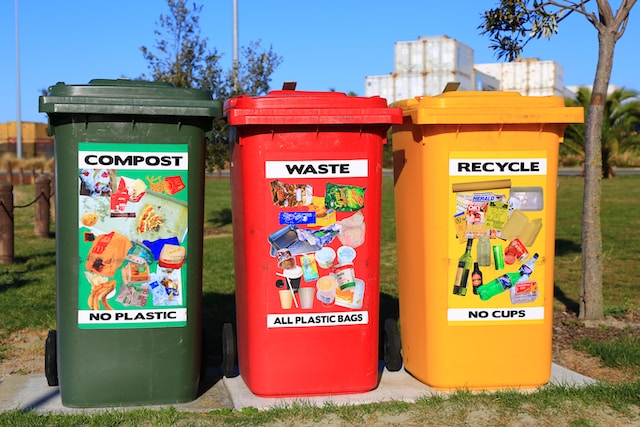 Different colored bins for waste segregation.