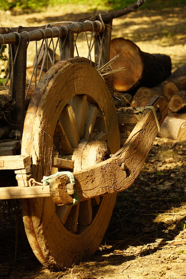 Worn-out wooden wagon wheel