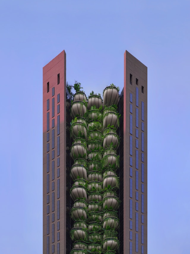 Futuristic building filled with green plants.
